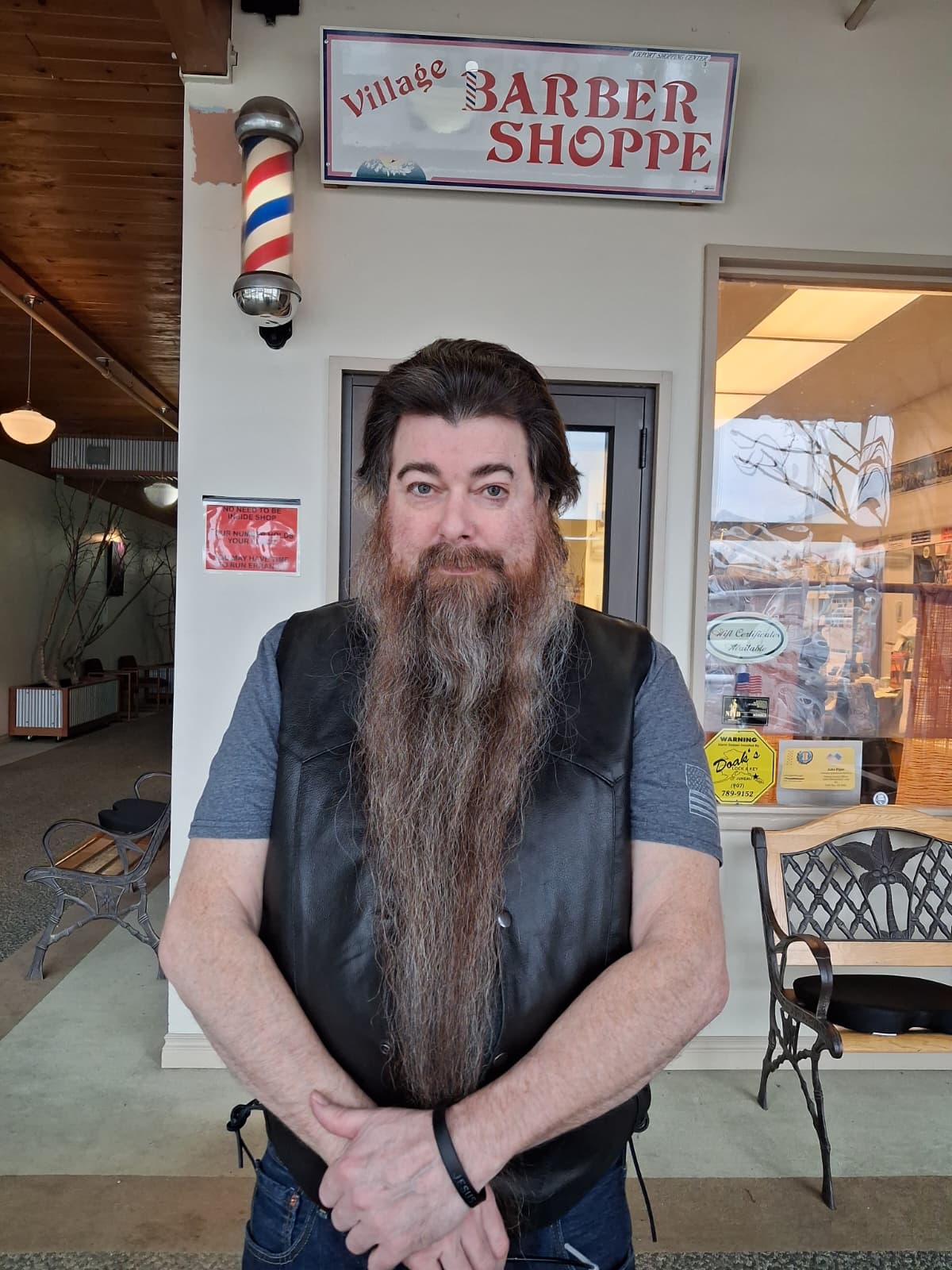 Joe, barber and owner of Village Barber Shoppe in Juneau, Alaska